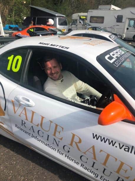 Image shows Matt Ritter in a caracing car with Value Racing sponsor logo.