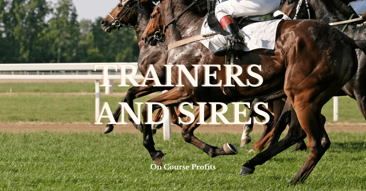 Image showing horses galloping on turf and riders boots.