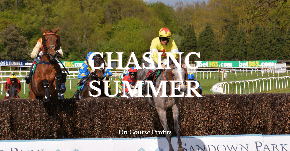 Horse jumping fence in race with jockey wearing yellow silks with red star.