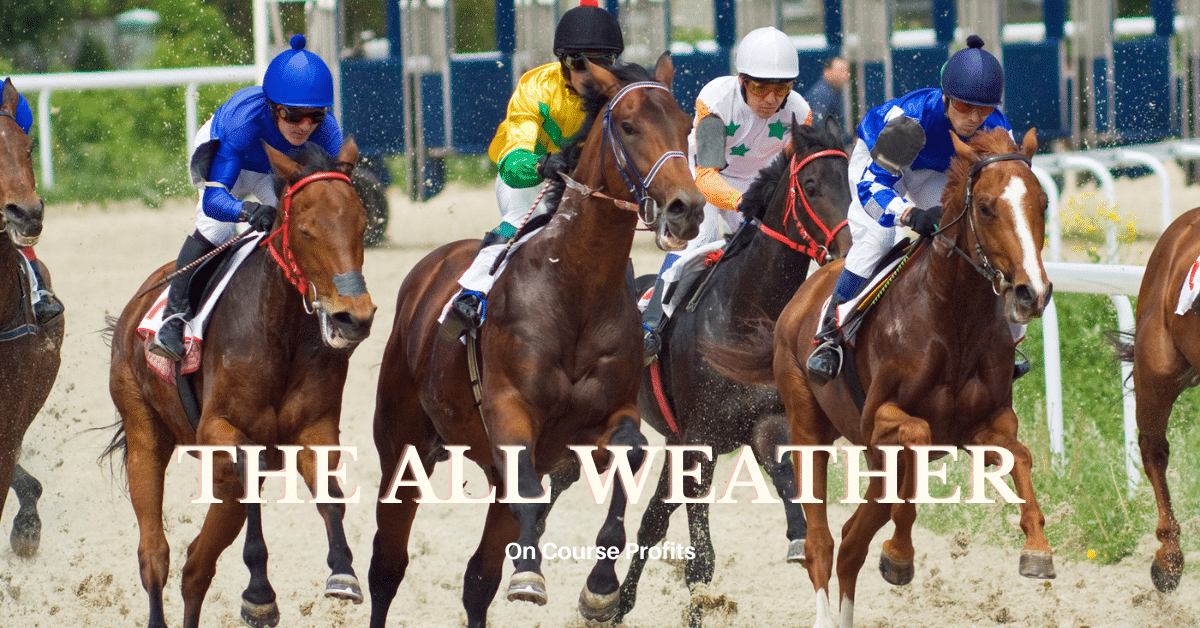 Image shows four horses racing on the all weather with the racing stalls being seen behind.