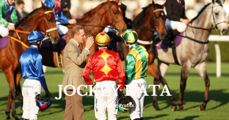 jockey's standing in a parade ring talking to a trainer.