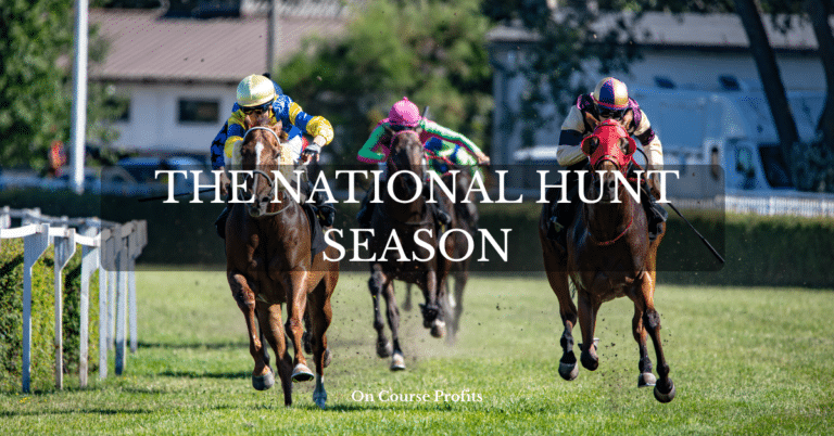 Image shows three horses and their jockeys rounding a corner at full gallop.